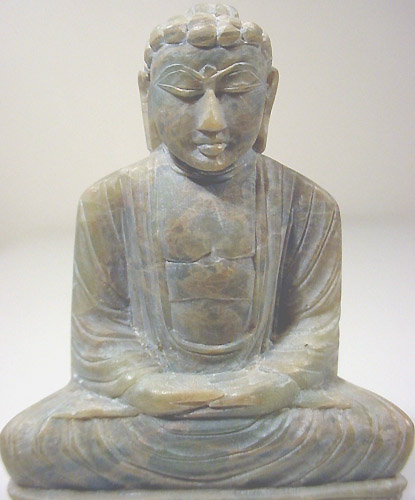 Meditation Buddha statue carved from marble stone of buddha meditating